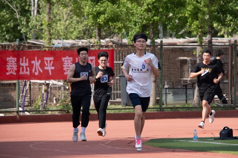 我们成功举办第十三届田径运动会